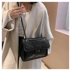 Black chevron chain shoulder bag, stylish crossbody handbag for women daily use.
