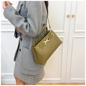 Olive green woven leather handbag for women, stylish shoulder tote bag with metal clasp.
