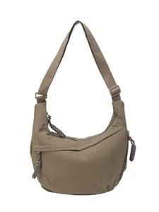 Casual crossbody dumpling shoulder bag for women, versatile nylon hobo bag with adjustable strap.