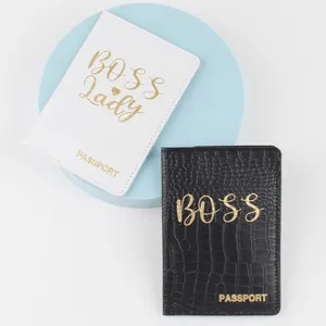 Crocodile PU passport holder detail view, stylish black and white cover design for travel safety.