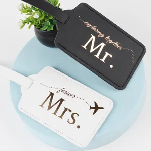 PU leather couple travel luggage tags set, black and white design with elegant gold lettering.