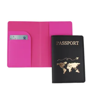 PU leather passport holder set in pink and black with card slots and gold world map design details
