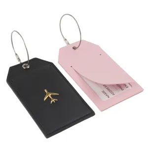 Set di etichette per bagagli in filo d'acciaio creative, dettagli di ciondoli in pelle.
