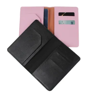 Porta pasaporte multifuncional de cuero PU funda organizador de viaje rosa y negro.