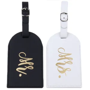 Set di etichette per bagagli di coppia in pelle PU, nero e bianco con scritte dorate.