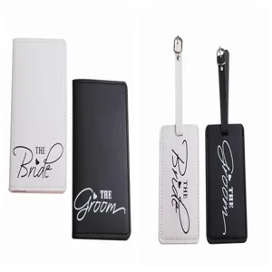 Couple PU leather passport holder and luggage tag set, white and black travel accessories.