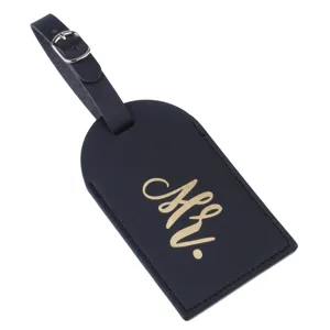 Black PU leather luggage tag detail featuring gold Mr text print and silver metal buckle.