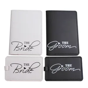 Couple passport cover and luggage tag set, white and black PU leather wedding travel accessories.