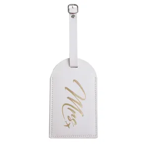 White PU leather luggage tag with gold Mrs text and airplane detail for travel suitcases.