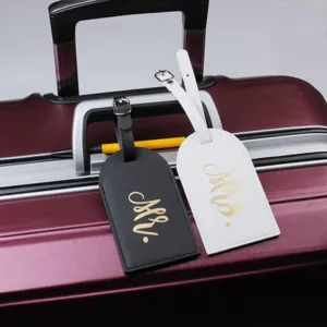 Couple PU leather luggage tags set with elegant Mr and Mrs gold print for travel.