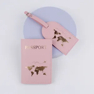 Pink PU leather passport holder and luggage tag set with gold world map travel accessories.