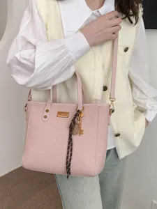 Pink woven tote bag, large capacity casual commuting shoulder handbag for women main view