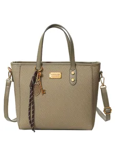Vintage large capacity tote bag for women, stylish commuting shoulder bag with chic charms.