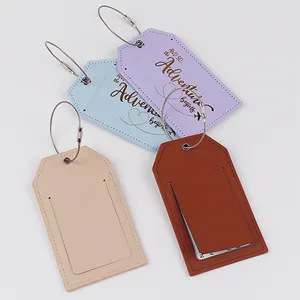 Etiquetas de equipaje de cuero PU colorido con cable de acero para maletas de viaje duraderas.