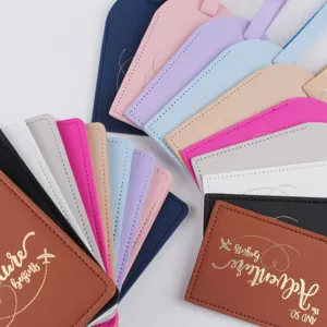 PU leather passport holder and luggage tag set with multi-color design for travel.
