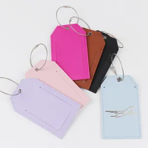 Etichette per bagagli in pelle PU colorata con cavo in acciaio, porta nome impermeabile.