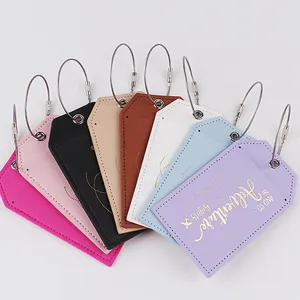 Etiquetas de equipaje de cuero PU de colores con lazo de alambre, ideal para maletas.