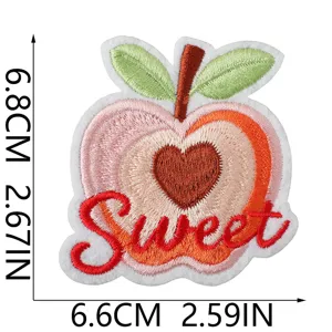 Detailed shot of summer fruit embroidered patch with sweet lettering and dimension markings.