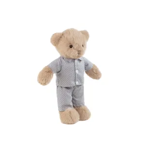 Cute brown plush teddy bear toy wearing grey polka dot pajamas, soft stuffed doll gift.