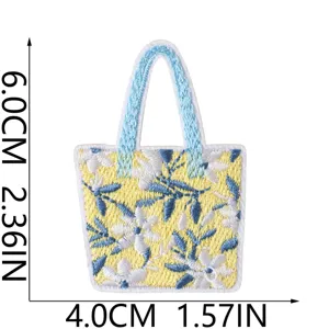 Detailed close-up view of a cute beach tote bag embroidered patch with vibrant floral design.