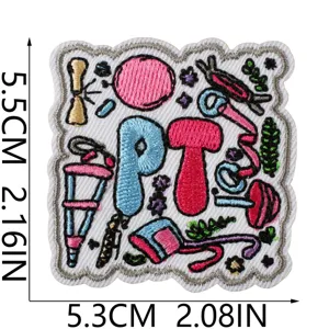 Close-up detail of the colorful PT letters embroidery patch featuring medical motifs.