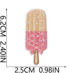 Ice cream patch detail view, cute embroidered popsicle motif with bow embellishment