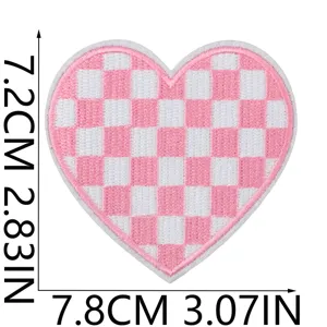 Detailed view of pink and white checkerboard heart embroidery patch, 7.8cm width size.