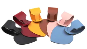 Detailed view of colorful PU leather heart luggage tags, ideal travel accessory set.