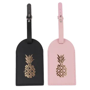 Etichette per bagagli in pelle impermeabile nera e rosa con motivo ananas dorato per viaggi.