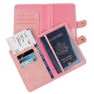 Pink PU leather passport holder detail showing multi-card slots and travel document organizer.