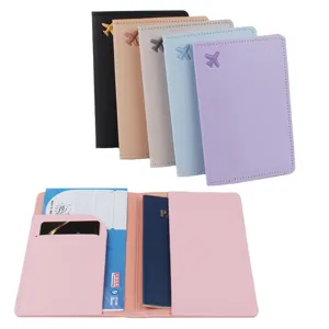 Porte-passeport en cuir PU avec broderie d'avion, pochette de voyage pour documents.