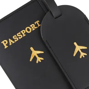 Black PU leather passport holder and luggage tag set detail, gold embroidery airplane pattern design.
