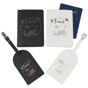 Detailed view of travel passport holder and luggage tag set with gold foil travel text design