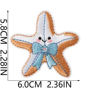 Starfish embroidery patch detail, blue bow accent, DIY denim jacket clothes decoration.