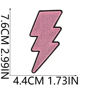 Pink embroidered lightning bolt patch detail view, measuring 7.6cm by 4.4cm in size.