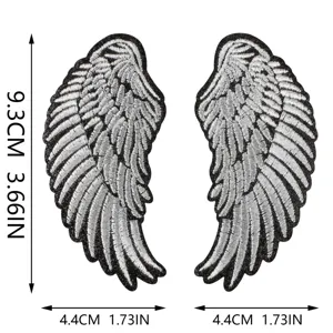 Detailed close-up of silver embroidered angel wing patches with precise size dimensions.