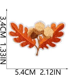 Autumn acorn and oak leaf embroidered patch detail for creative DIY clothing repair.