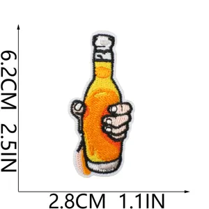 Detailed view of the beer bottle embroidery patch, showing exquisite craftsmanship and texture.