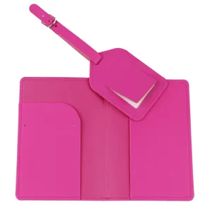 Bright pink passport holder and matching luggage tag set, perfect travel accessory detail.