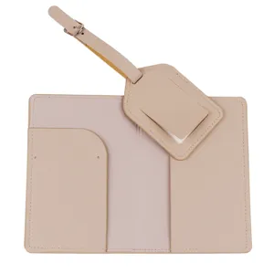 Detailed view of nude pink leather passport holder and matching luggage tag set, elegant.