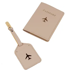 Beige PU leather passport holder and luggage tag travel set with airplane icon design.