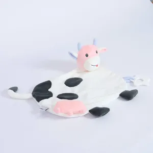 Pink cow baby security blanket plush toy detail shot with soft fabric and teether.