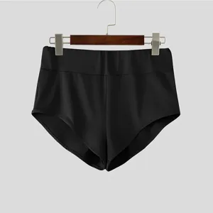 Pantaloncini sportivi aderenti a vita alta tinta unita da uomo per fitness e allenamento.