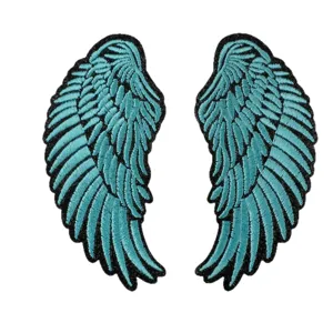 Exquisite turquoise angel wings embroidered patches, perfect for DIY clothing and canvas decor.