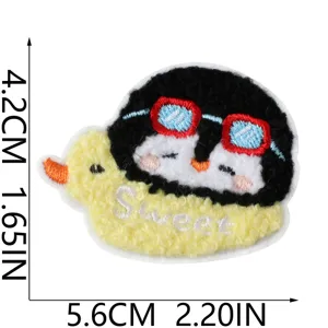 Cute penguin embroidered patch with sunglasses, iron-on DIY accessory for clothing bags.
