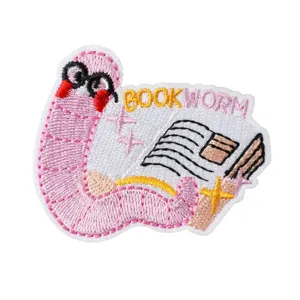 Cute bookworm embroidered iron-on patch for clothing repair, DIY apparel and backpack decor.