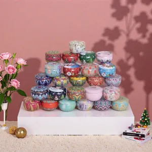Scatole di latta rotonde decorative con motivi floreali e festivi colorati per regali.