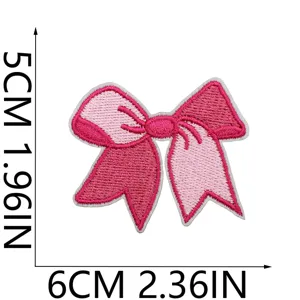Simpatico patch ricamato a fiocco rosa per vestiti fai-da-te, applicazione termoadesiva.