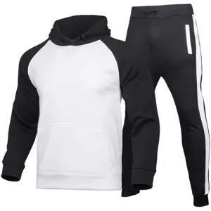 Men's casual black and white hooded tracksuit set with raglan sleeves and stylish stripe design.