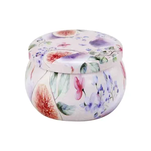 Boite en metal ronde avec impression elegante de figues et fleurs, ideale pour bougies.